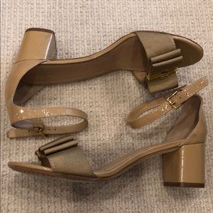 Tory Burch nude patent with grosgrain bow detail